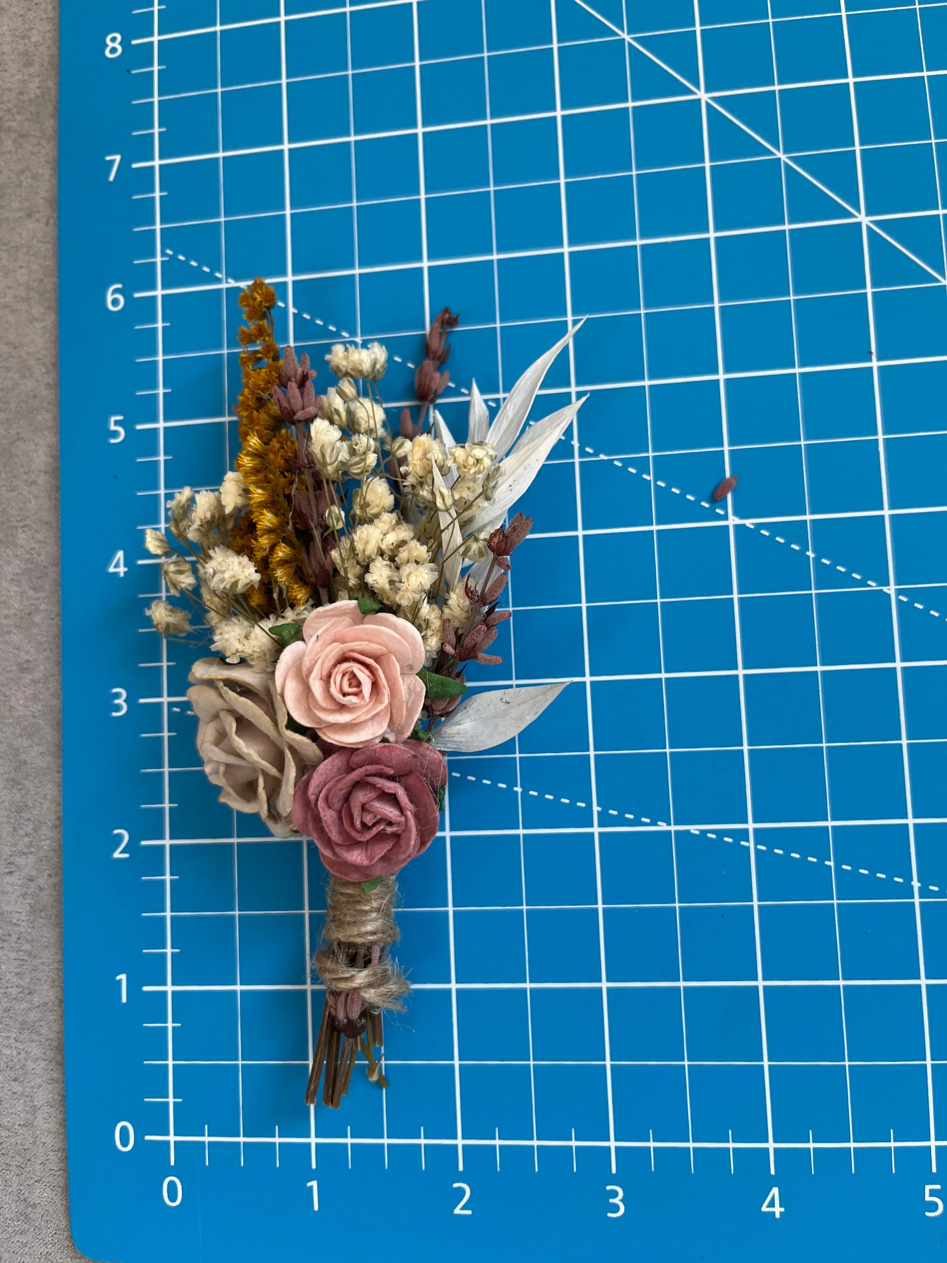 Romantic groom's boutonniere